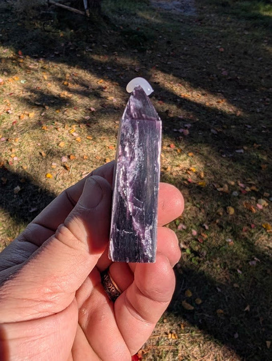 Side profile of Brazilian Purple Lepidolite tower showing layered mica and violet shimmer