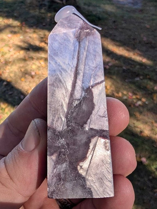 Purple Lepidolite Mica Tower (#4) in hand, showing proportions and polished geometry