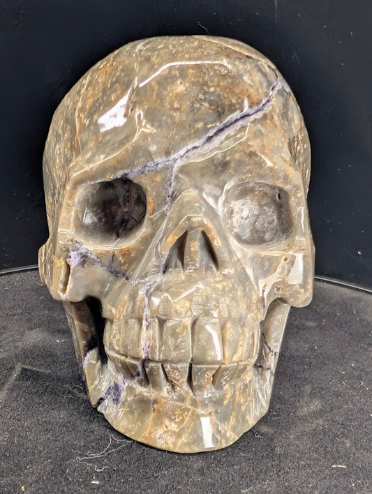 Alternate front view of Purple Silk Fluorite Skull with defined carving and polish
