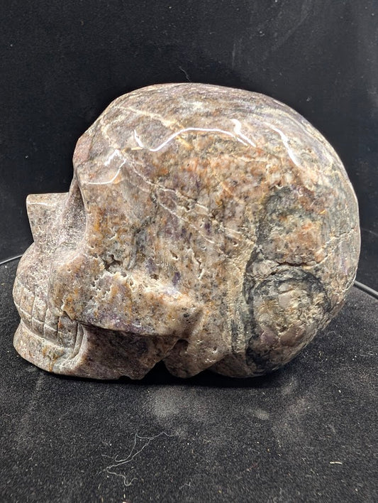 Left profile of Purple Sphalerite skull with lavender tones and resinous shine