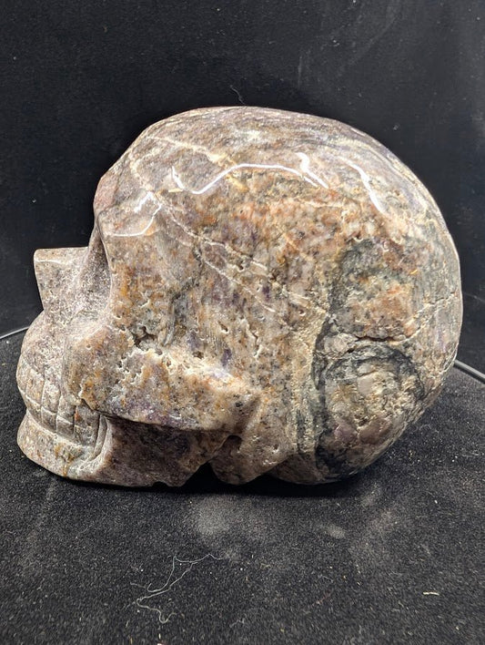 Left profile of Purple Sphalerite skull with lavender tones and resinous shine