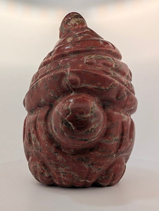 Red Jasper Gnome carving – front view showing brick-red tone and polish