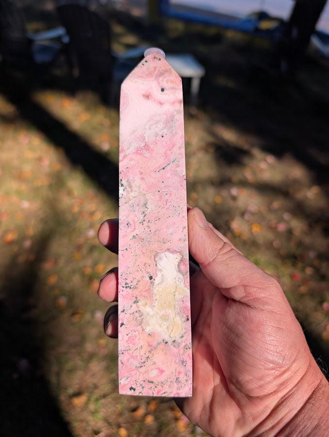 Back face of Peruvian Rhodonite Tower #1 highlighting marbled pink tones and oxide patterning