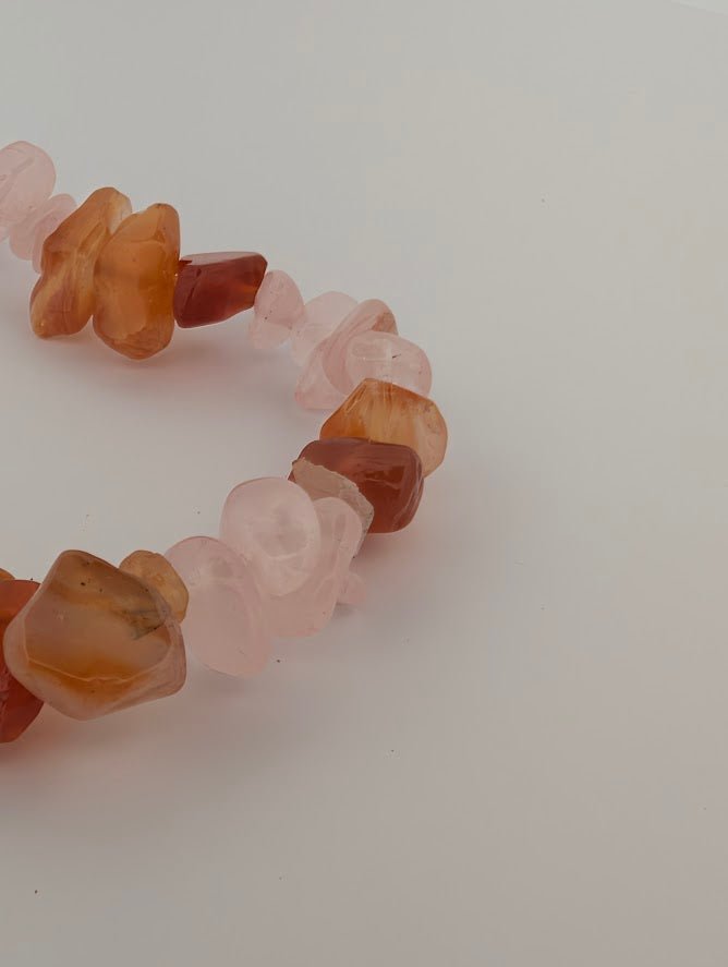 Detail of chip shapes and glossy finish on Rose Quartz and Carnelian bracelet