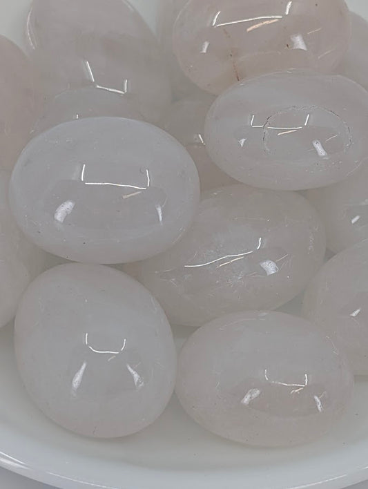 Close-up of soft pink Rose Quartz tumbles