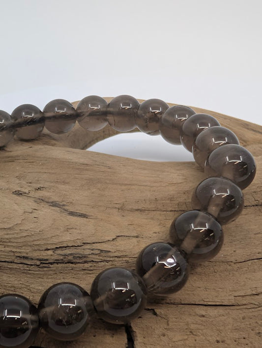 Close-up of Smoky Quartz bracelet beads with smoky translucence