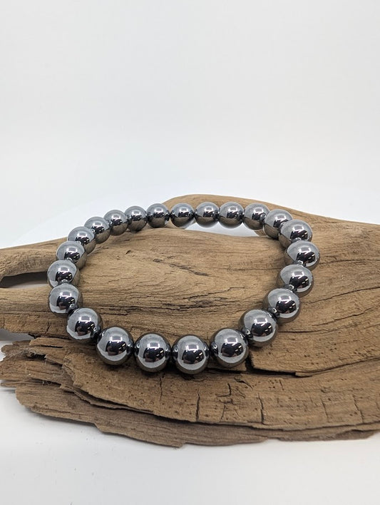 8MM Terahertz bracelet displayed on wood background