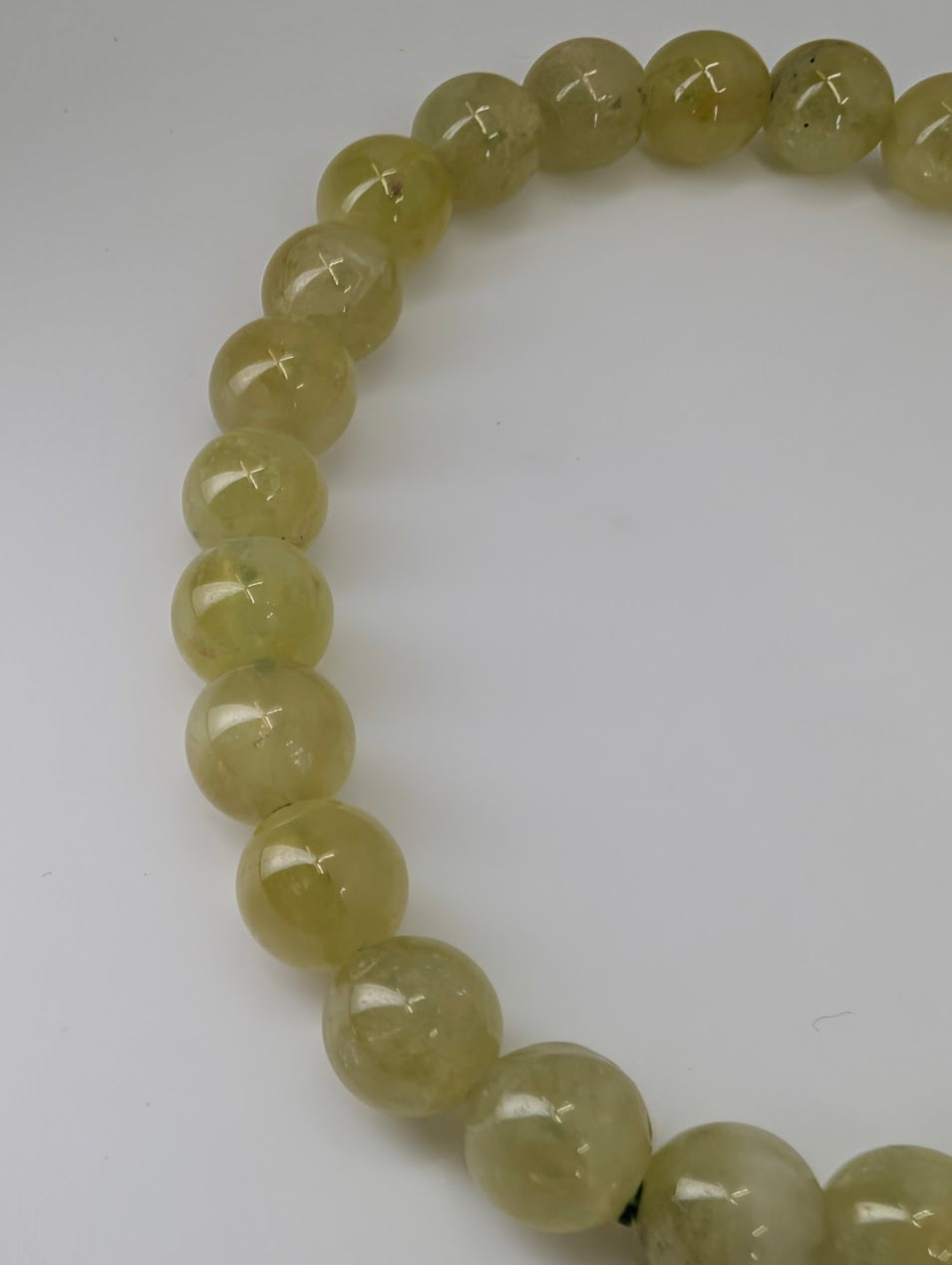 Tsavorite Garnet bracelet showing light reflection and internal texture of beads