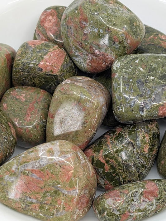 Close-up of Unakite stones highlighting epidote and feldspar mix