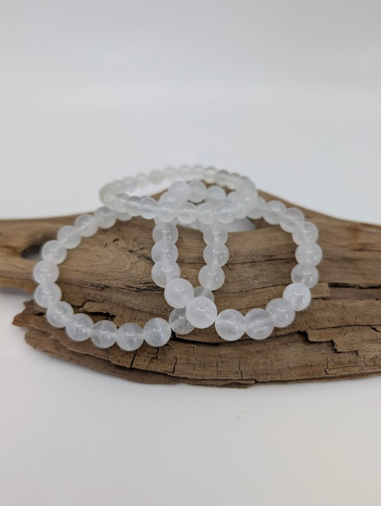 Velvet Fluorite bracelets in natural light showing translucent white tone and silky texture