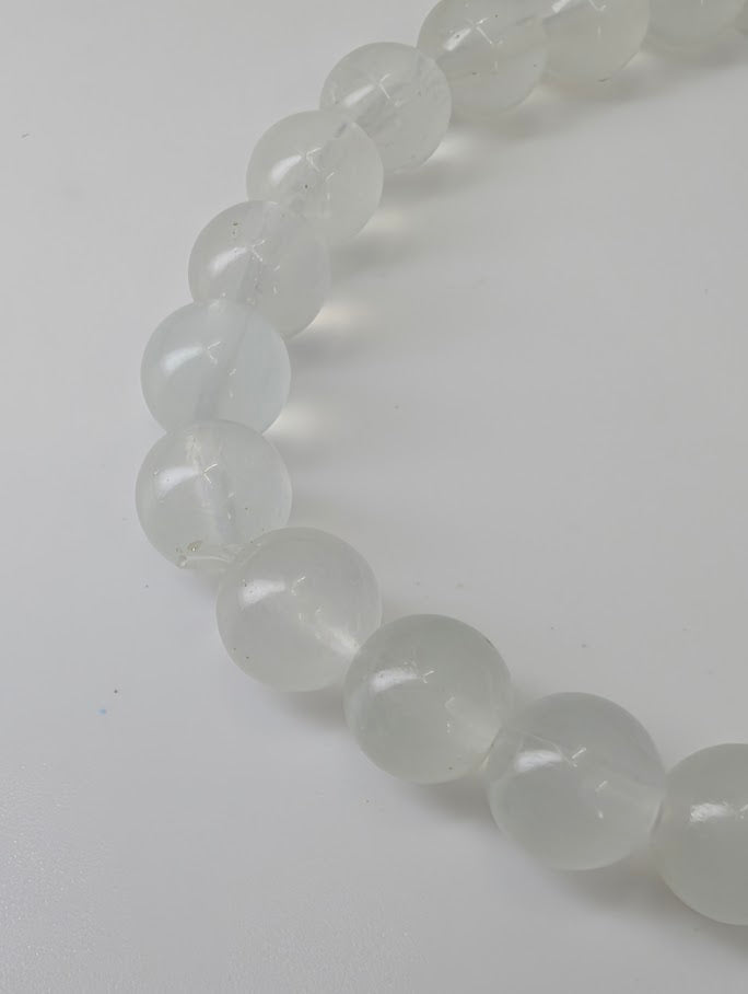 Macro image of Velvet Fluorite beads highlighting clarity and natural banding