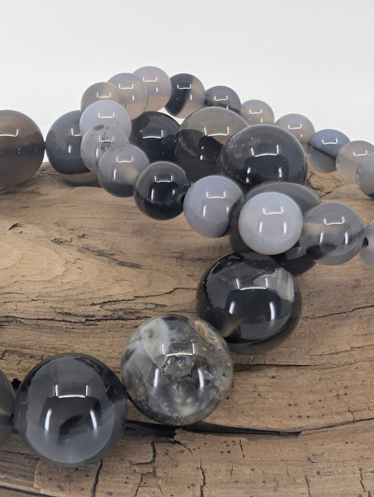 Close-up of Volcano Agate bracelet highlighting smooth polish and layers