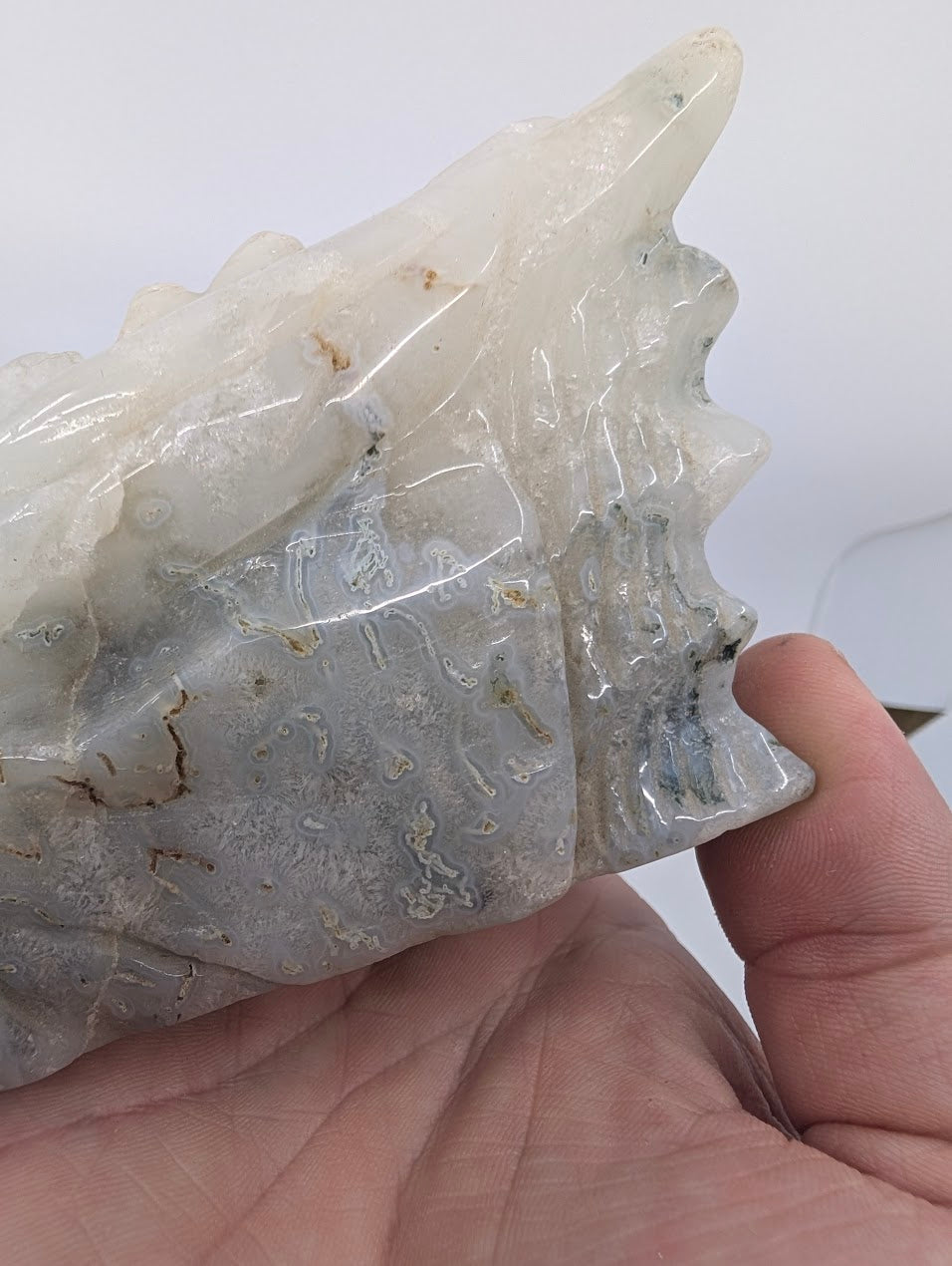 Handheld view showing size and natural jasper patterning