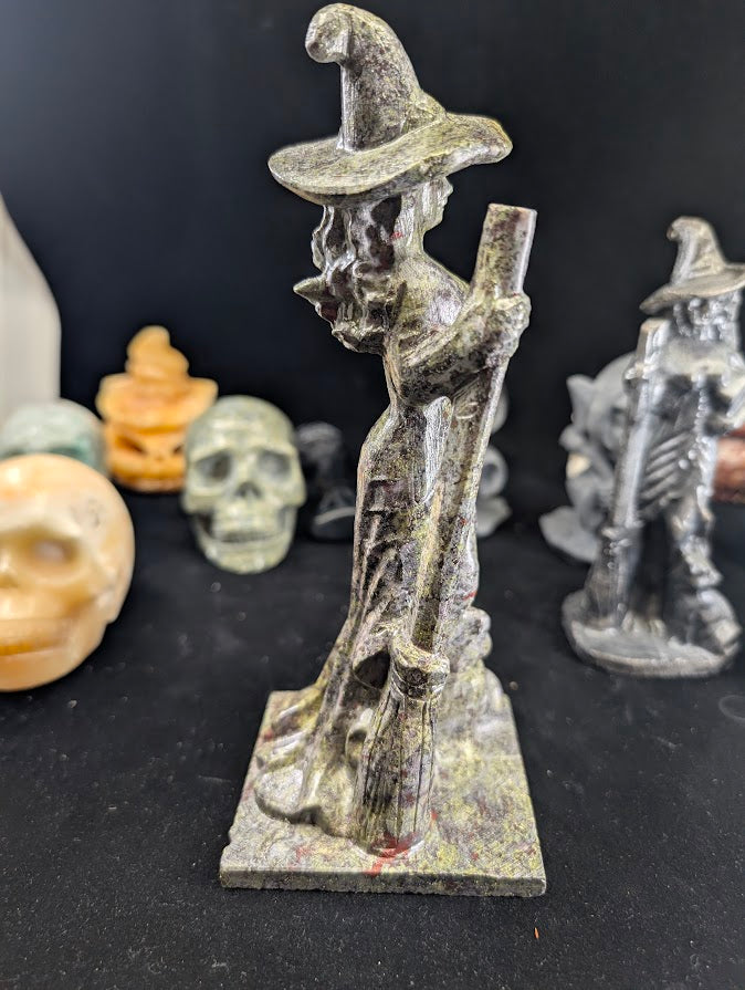 Dragon Blood Jasper Witch Carving – Angled View showing green and crimson contrast