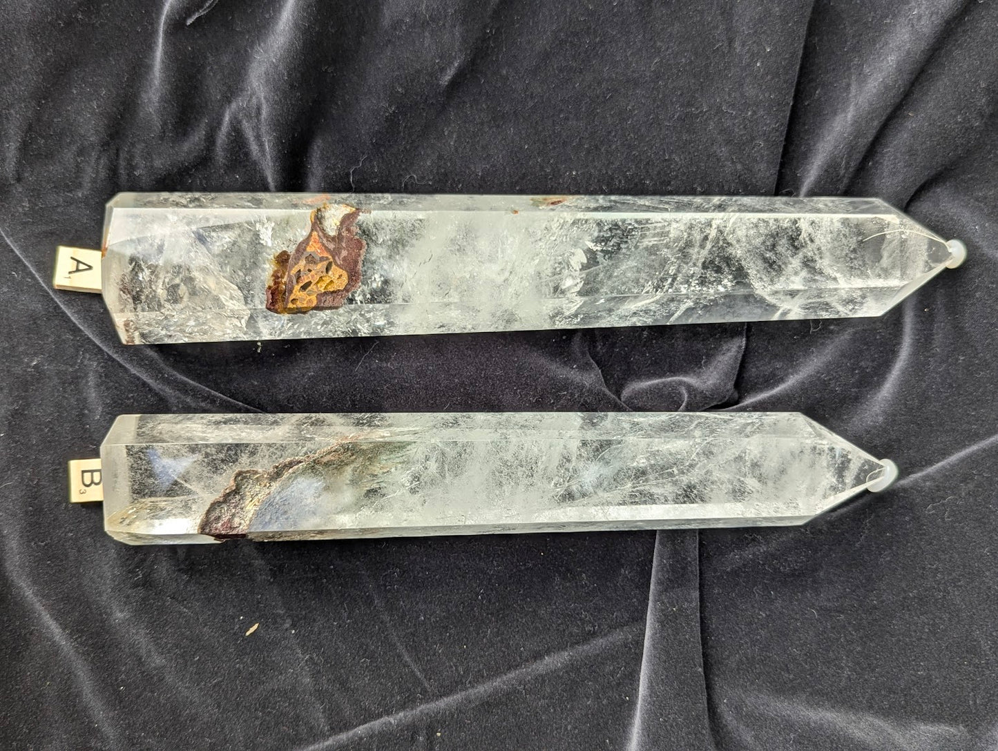 XL Garden Quartz Towers A and B laid side by side showing natural garden inclusions and polished faceted points