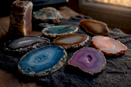 Natural and dyed agate stones close-up on cloth