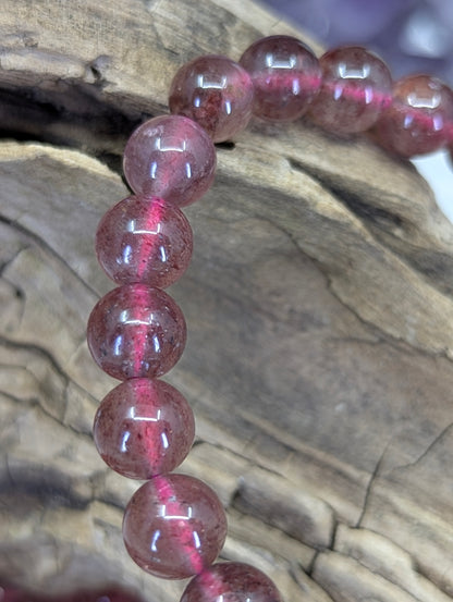 Closeup of 6mm Strawberry Quartz Bracelet