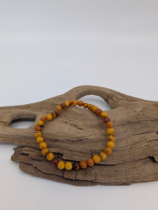 Baltic Amber Bracelet 5–6 mm Russian Origin – front view showing warm butterscotch and caramel tones
