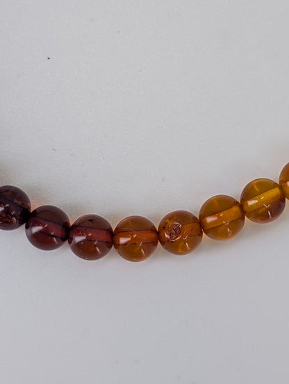 Baltic Amber Bracelets 4 mm and 4.8 mm – detailed close-up highlighting clarity and polish