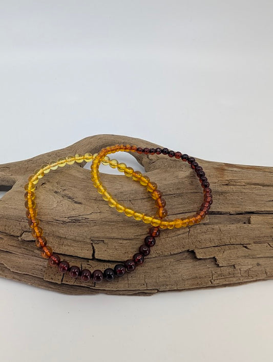 Baltic Amber Bracelets 4 mm and 4.8 mm – front view showing gradient from honey to cognac