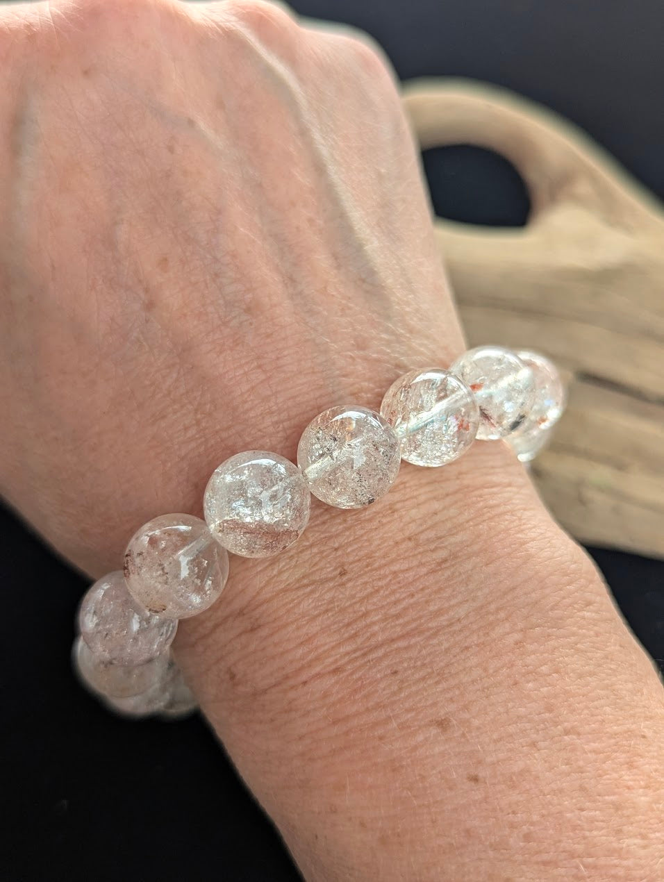 13mm AAA Grade Himalayan Garden Quartz beaded stretch bracelet worn on a wrist.