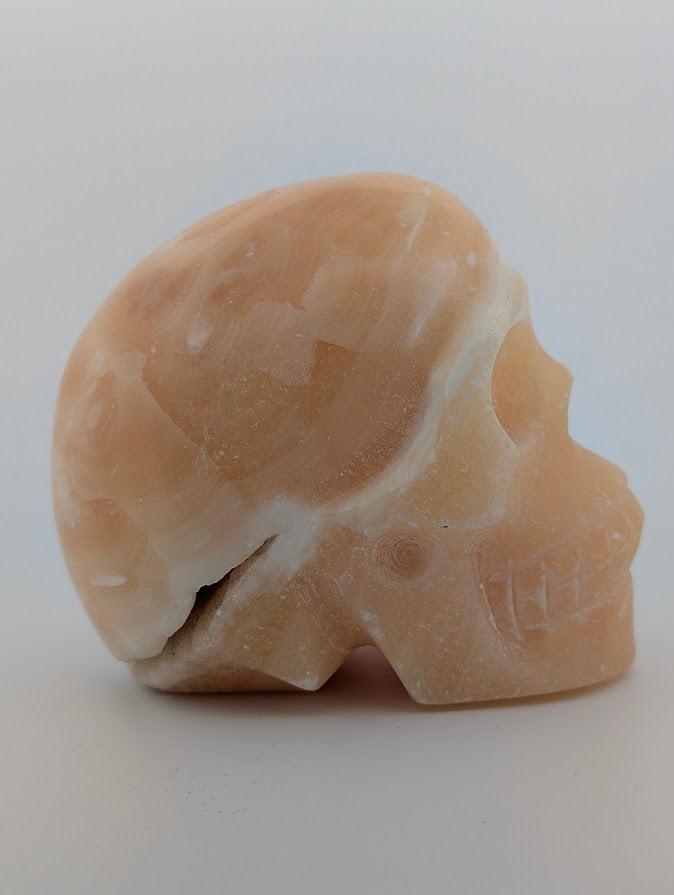 Orange Calcite Crystal Skull ~500g hand-carved carving with warm orange glow