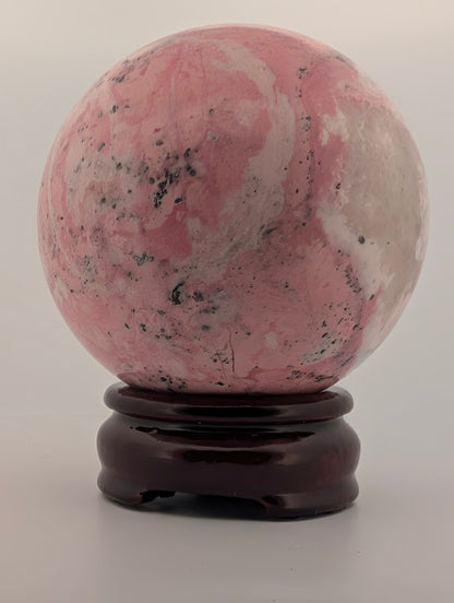 Pink Peruvian Rhodonite Sphere (D) – 80 mm / 925 g