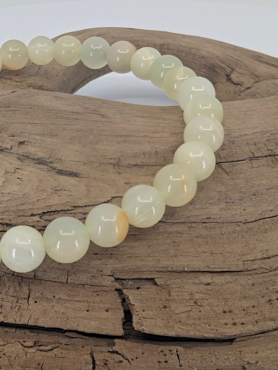 Closeup of pale green Afghan Jade beads