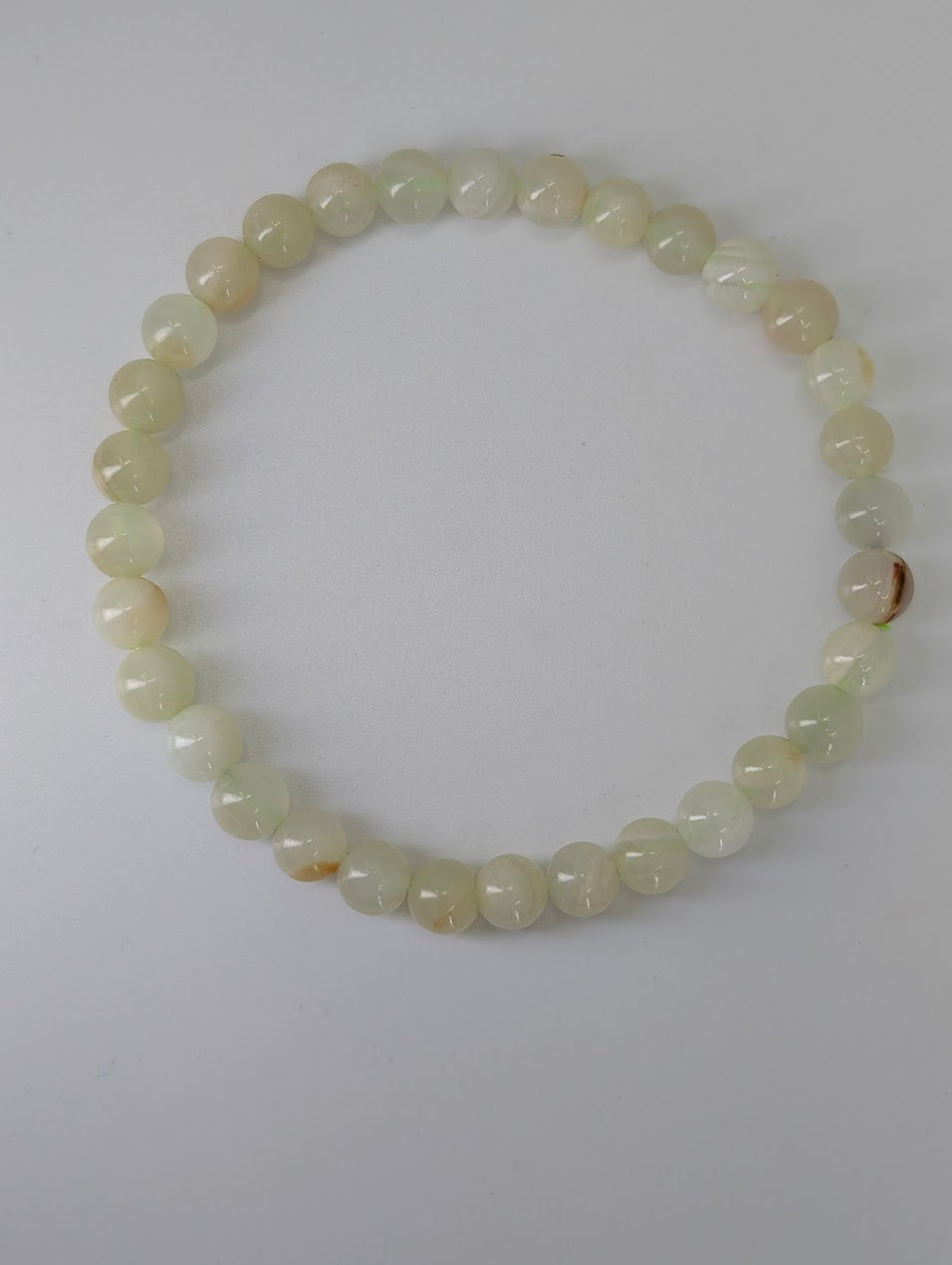 6mm Afghan Jade serpentine bracelet on white background