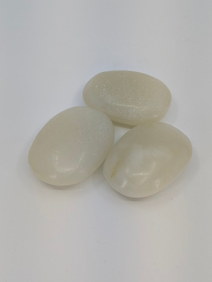 Afghan Jade palm stones with soft milky tone and subtle shimmer, natural polished finish front view