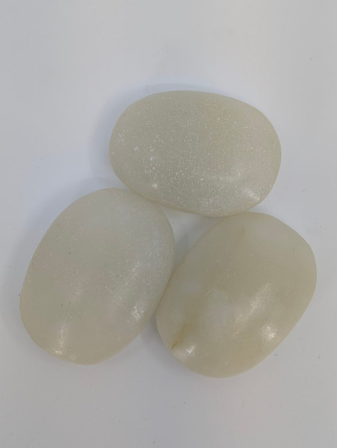 Afghan Jade palm stones grouped together highlighting soft color and smooth matte texture
