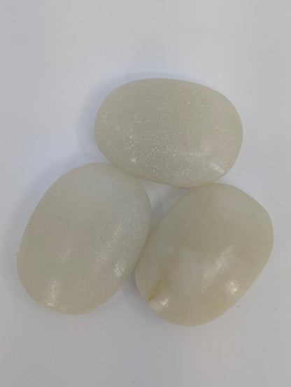 Afghan Jade palm stones grouped together highlighting soft color and smooth matte texture