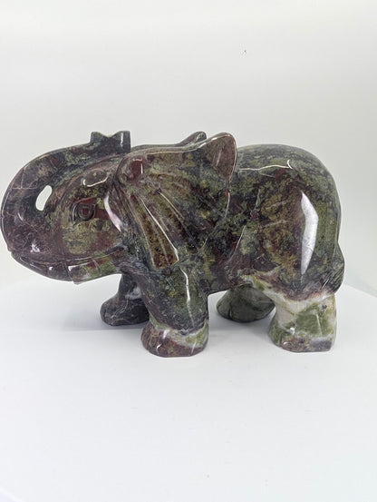 African Bloodstone elephant carving, left side view