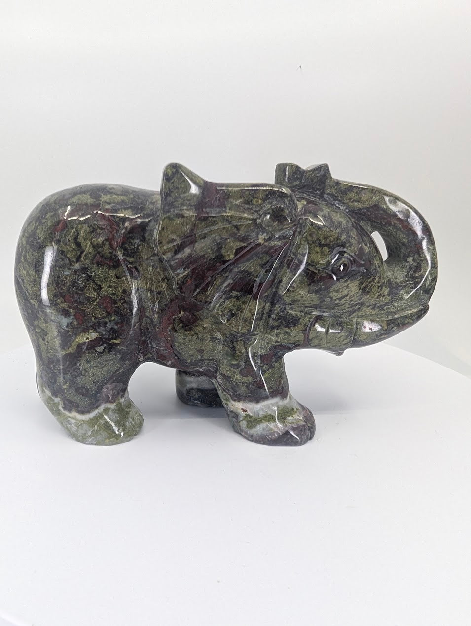 Right side view of African Bloodstone elephant carving