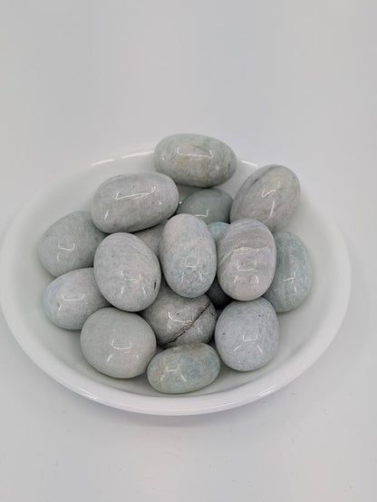 Amazonite tumbled stones A grade in bowl