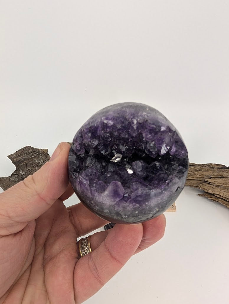 Hand-held view of Amethyst sphere Specimen G.