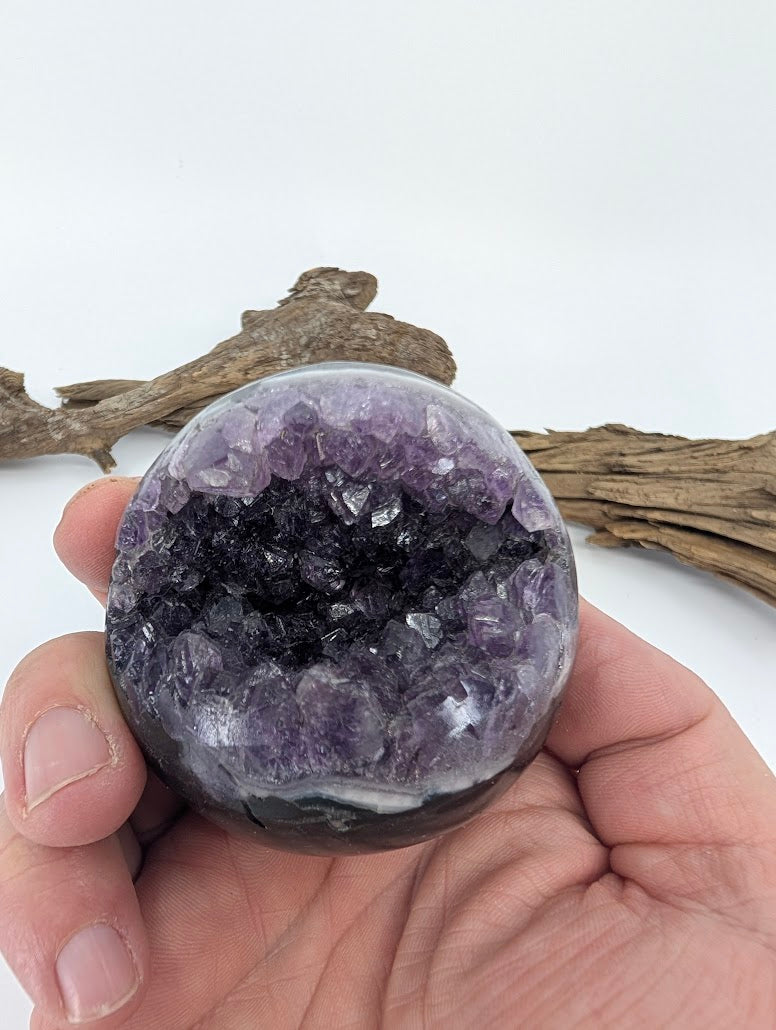 Hand-held view of Amethyst sphere Specimen L.