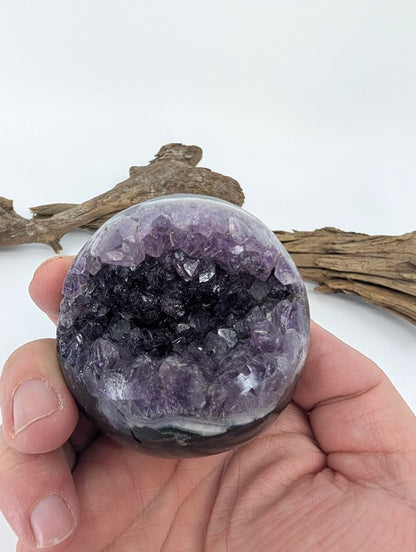 Hand-held view of Amethyst sphere Specimen L.
