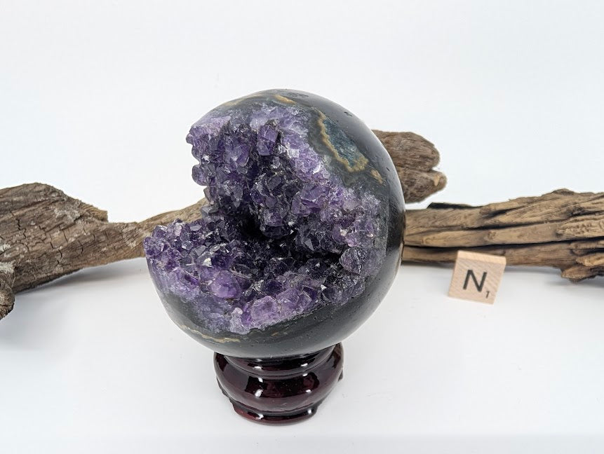Front view of Amethyst sphere with distinct agate banding (Specimen N).