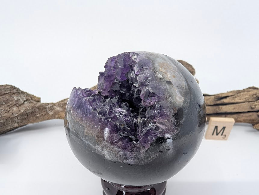 Angled view of Specimen M showing enclosed crystal cave.