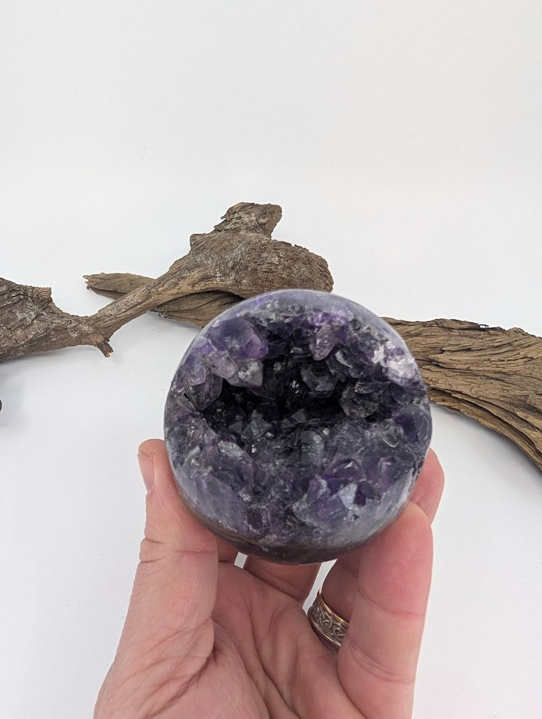 Hand-held view of large Amethyst sphere Specimen E.