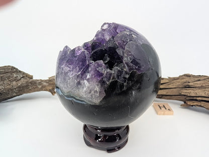Front view of large Amethyst sphere with white agate rim (Specimen H).