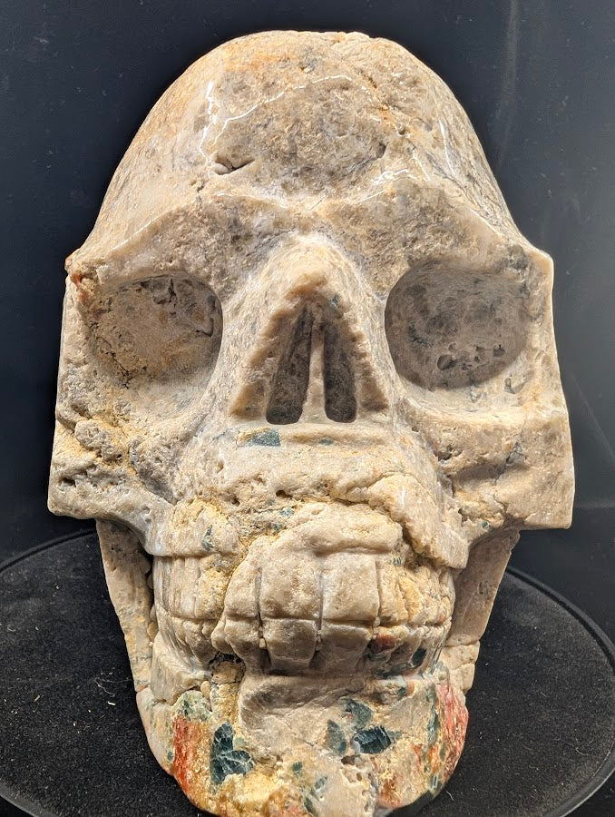 Close-up of face and teeth with gemmy blue apatite and earthy jasper tones