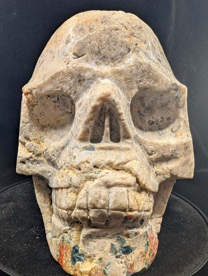 Close-up of face and teeth with gemmy blue apatite and earthy jasper tones