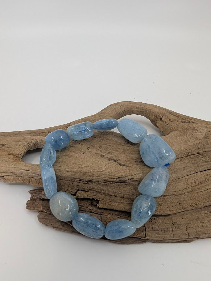 Natural Aquamarine freeform bracelet showing polished blue beryl stones