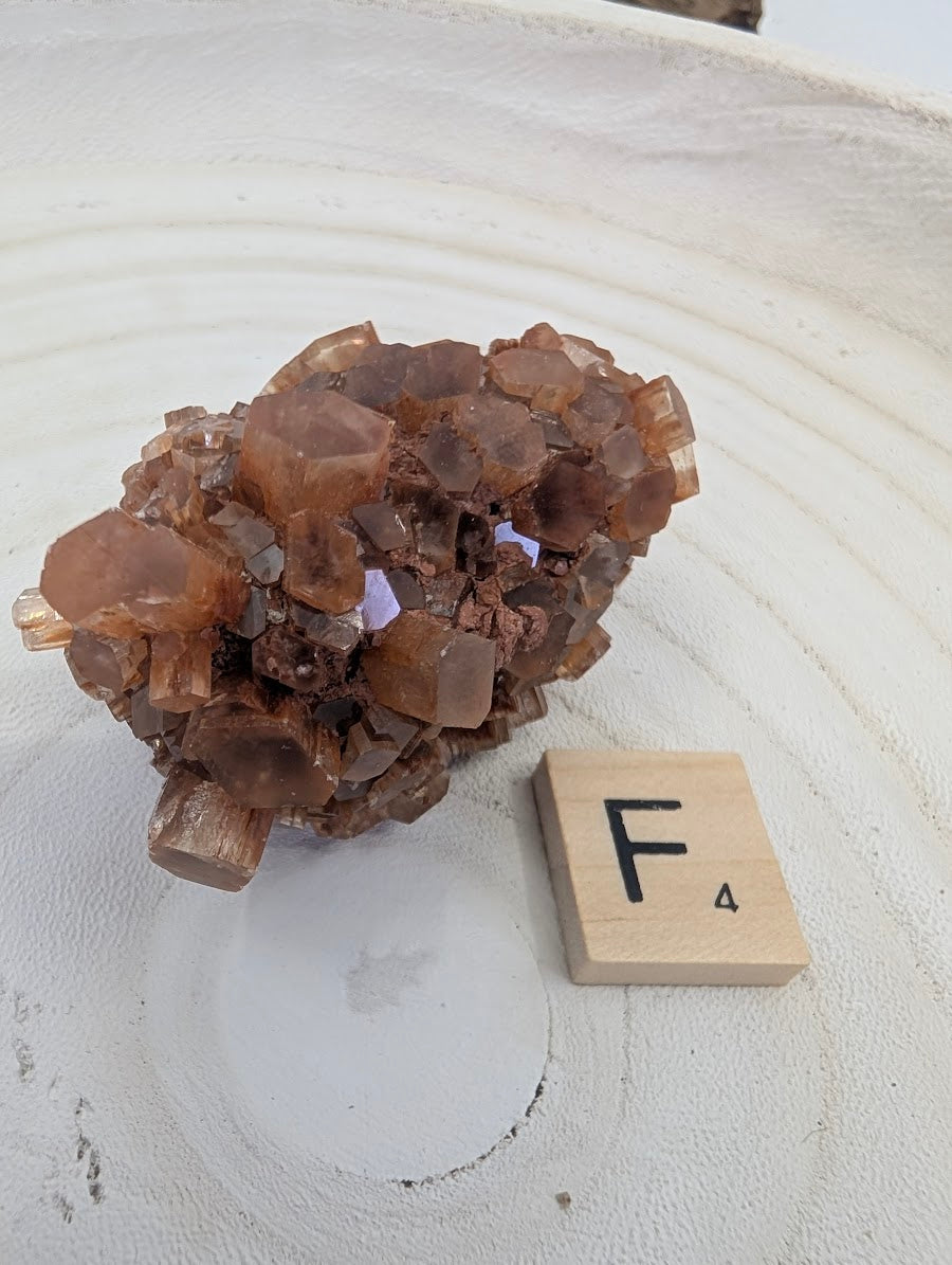 100g AA Grade Aragonite Star Cluster, large radial formation with deep sienna coloration.