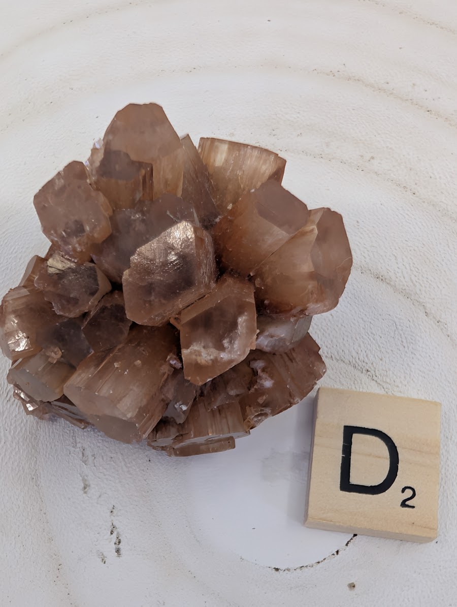 Small 65g Aragonite Star Cluster specimen with high-luster terminations and honey-amber color.