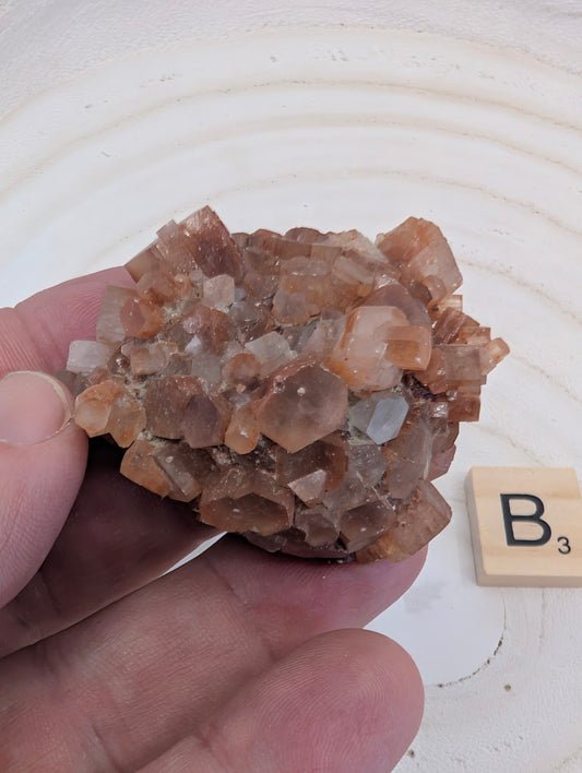 75g Sputnik Aragonite Star Cluster showing amber-brown cyclic twinning and sharp terminations.