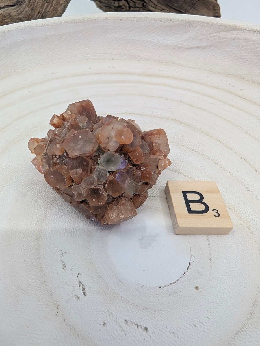 75g Sputnik Aragonite Star Cluster showing amber-brown cyclic twinning and sharp terminations.