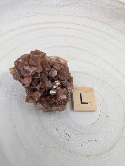 90g Moroccan Aragonite Star Cluster, all-natural reddish-brown crystals with vitreous luster.